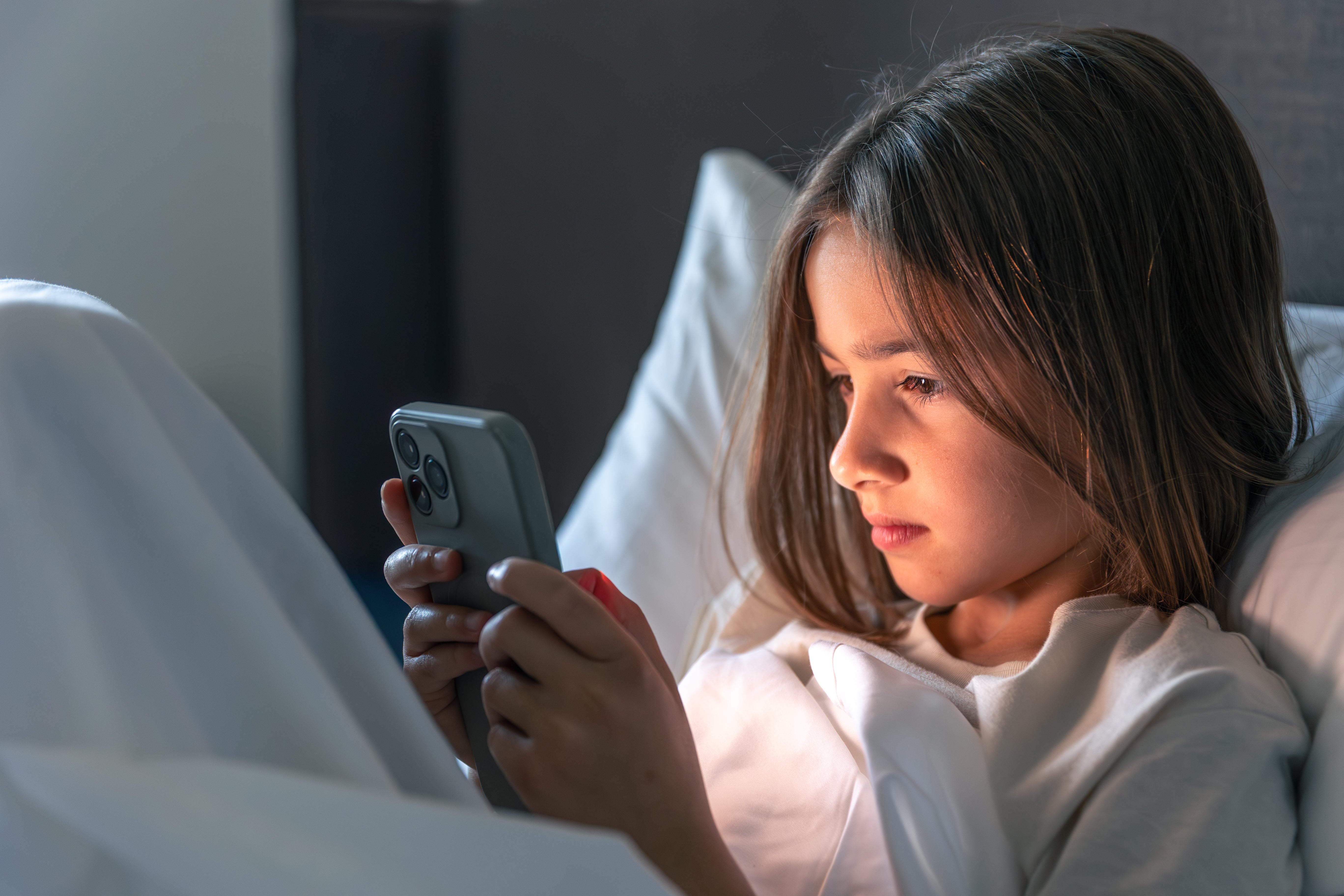 How to Reduce Blue Light on iPhone: Night Shift vs. Screen Protectors